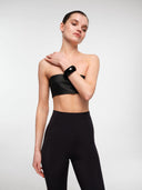 Black high-rise leggings by MOSAÏKA close-up on model