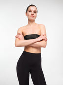 Black high-rise leggings by MOSAÏKA close-up portrait on model