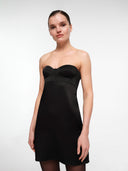 Black bustier mini dress by MOSAÏKA worn on model mid-length front view