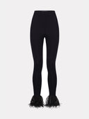 Black leggings with removable raffia trim by MOSAÏKA front view