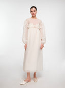 Off-white water lily dress by MOSAÏKA worn on model straight pose